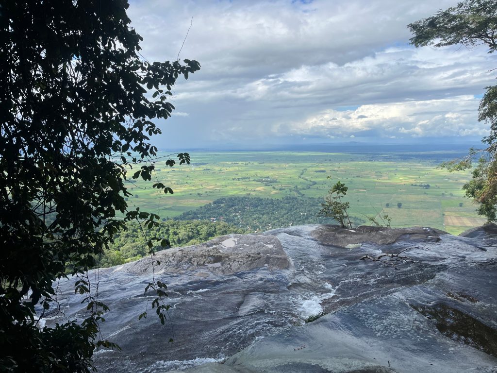 Viewpoint at the top of the falls over the farmland plain, Udzungwa Mountains National Park