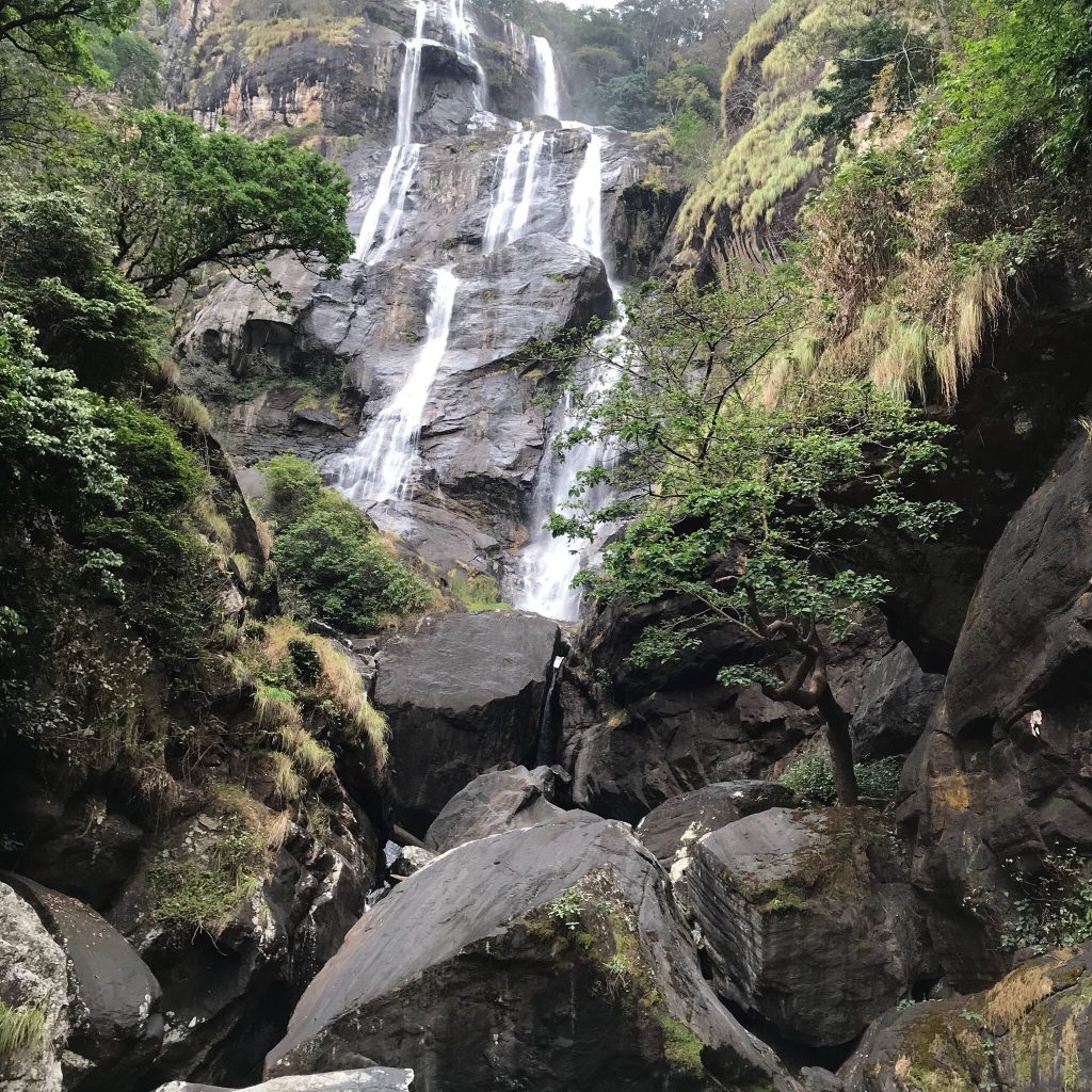 Sanje Falls full drop above a boulder-strewn base, Udzungwa Mountains National Park