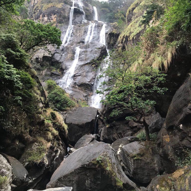 Sanje Falls full drop above a boulder-strewn base, Udzungwa Mountains National Park